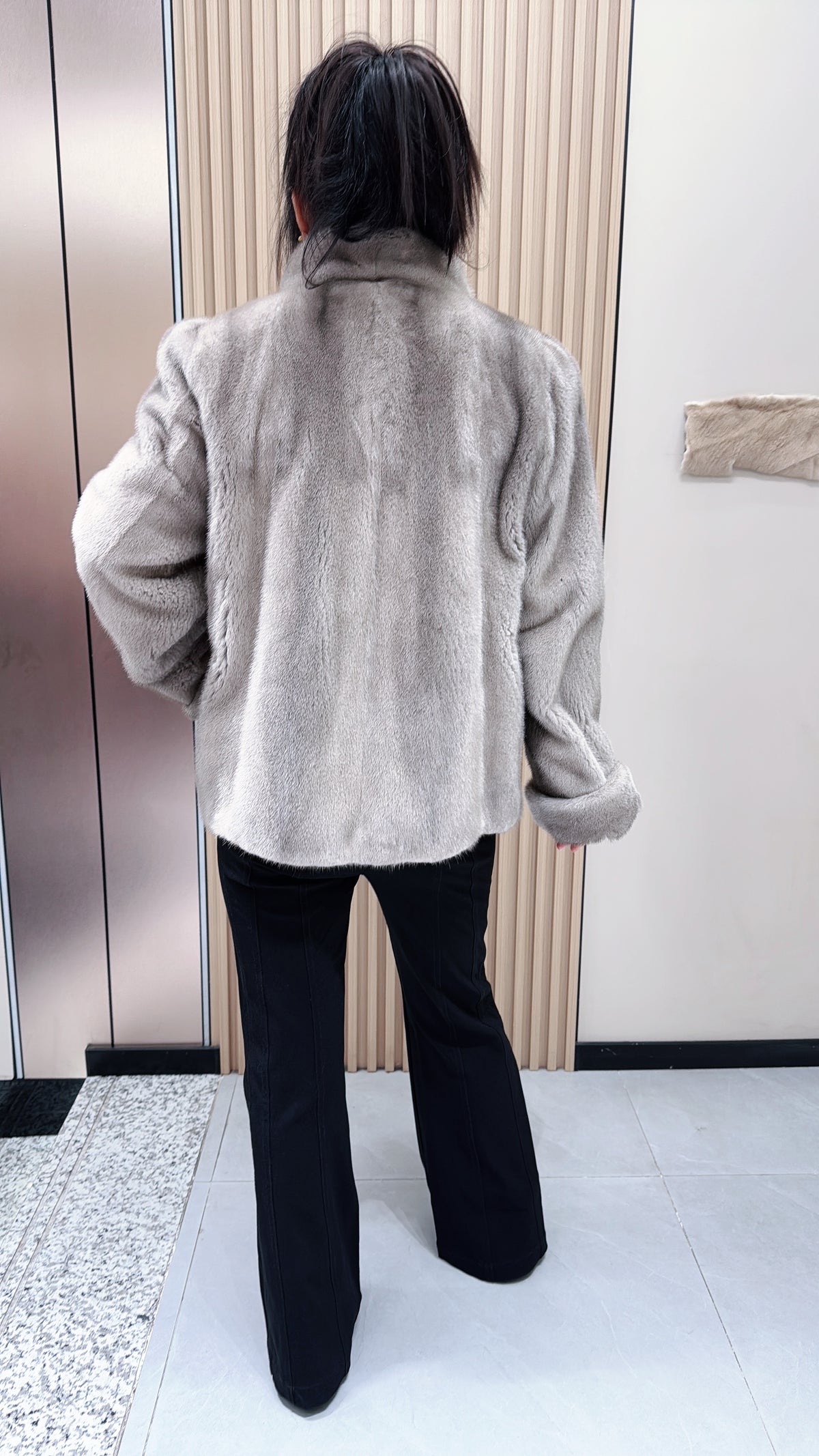 No. 097 Silver-blue mink fur coat, featuring a stand-up collar and turn-back cuffs accented with bronze-colored buttons.