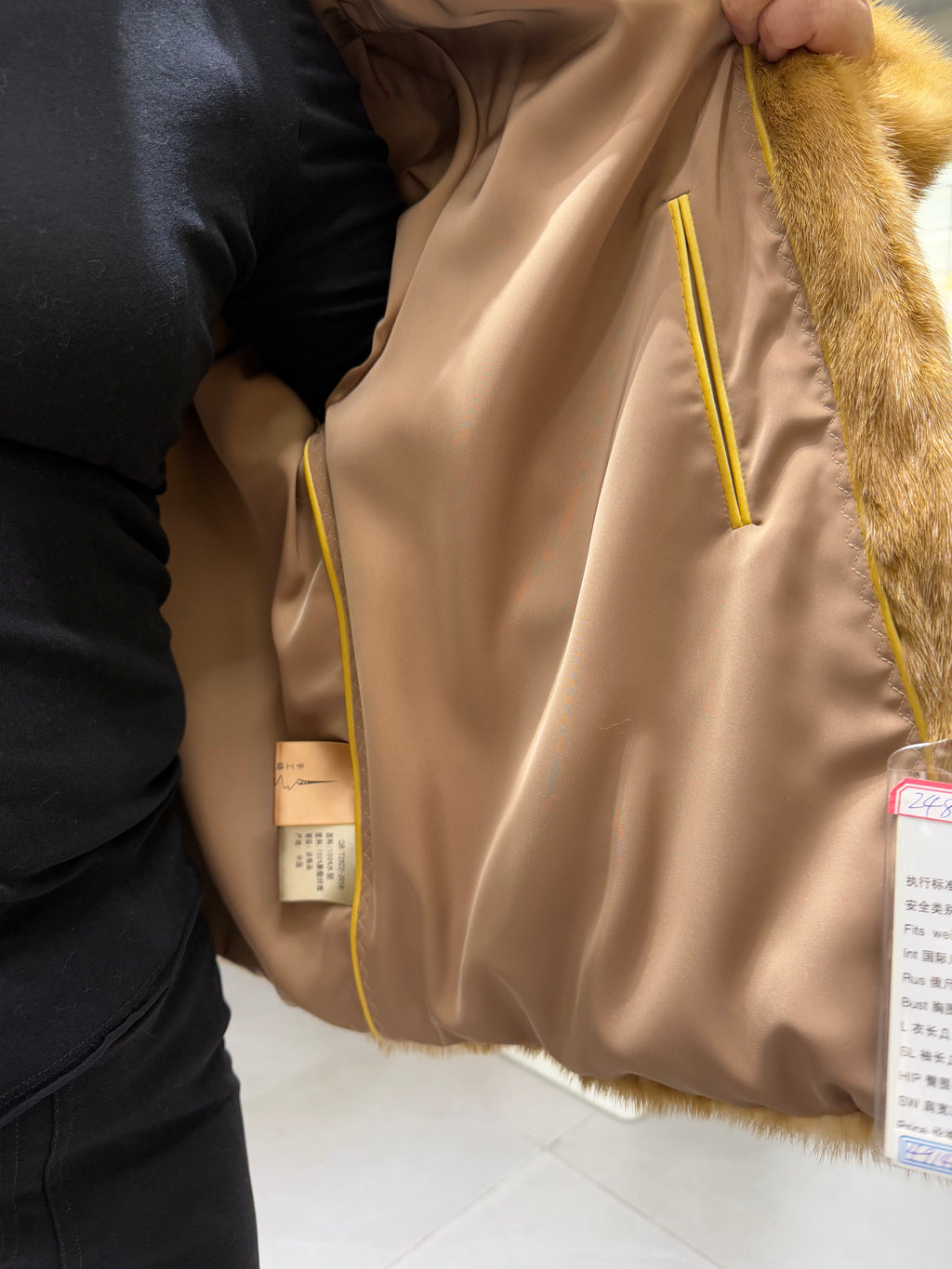 No. 098 Dark beige mink fur coat featuring a V-neck design.