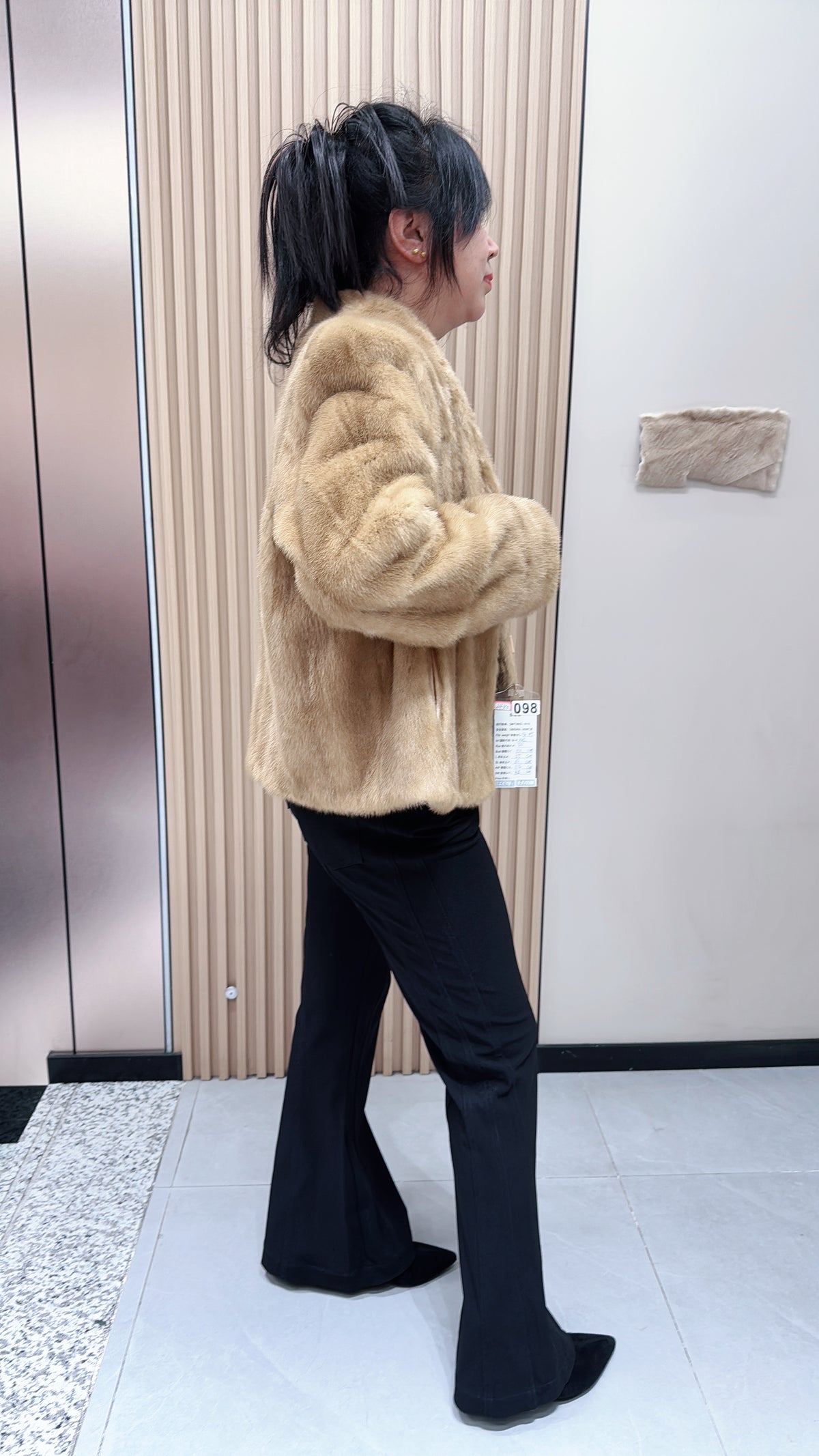 No. 098 Dark beige mink fur coat featuring a V-neck design.