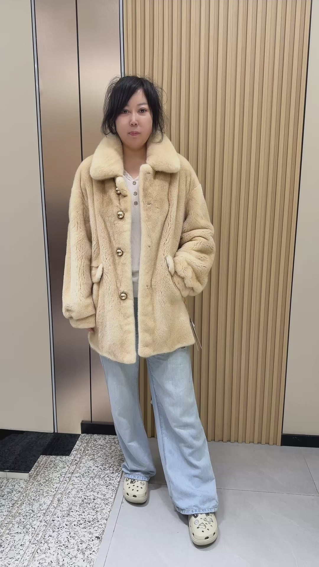 No. 009 Beige velvet-finish mink coat featuring a lapel collar, horizontal pocket flaps, and vintage-style button detailing.