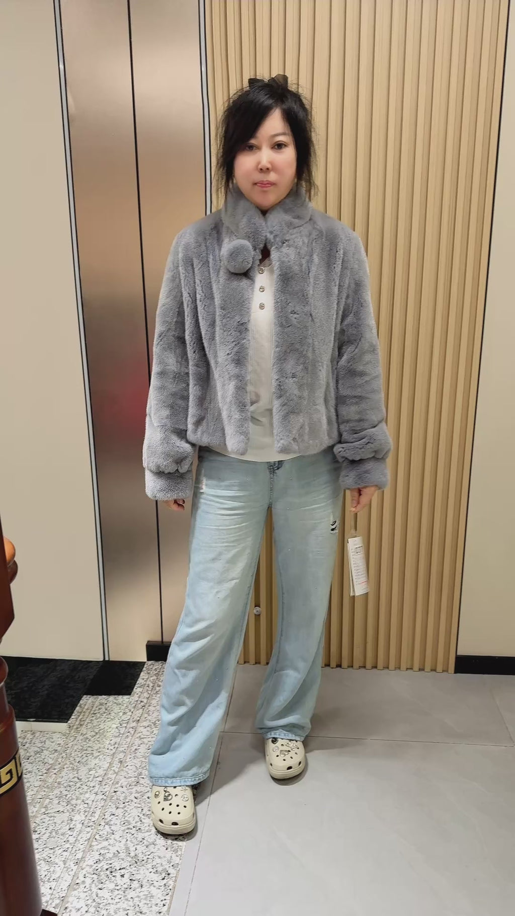 037 Grey mink fur coat featuring a stand-up collar and banded cuffs.