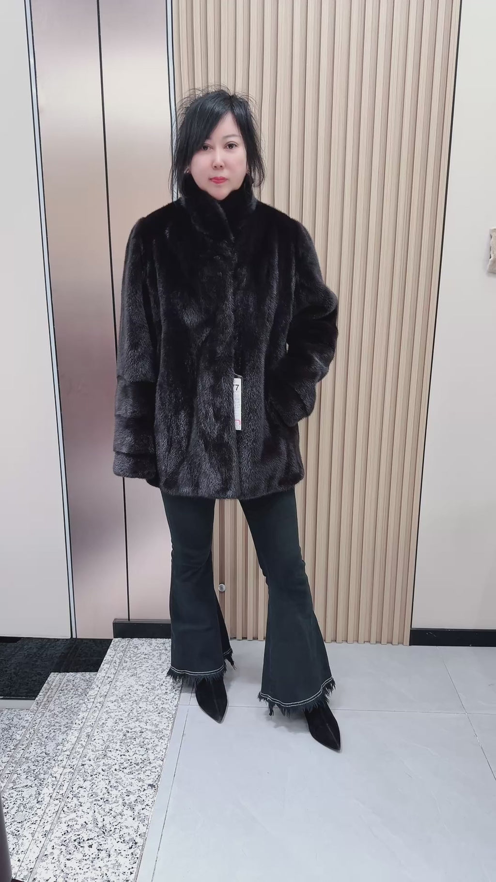 No. 077 Dark brown mink fur coat with convertible stand/fold-down collar.