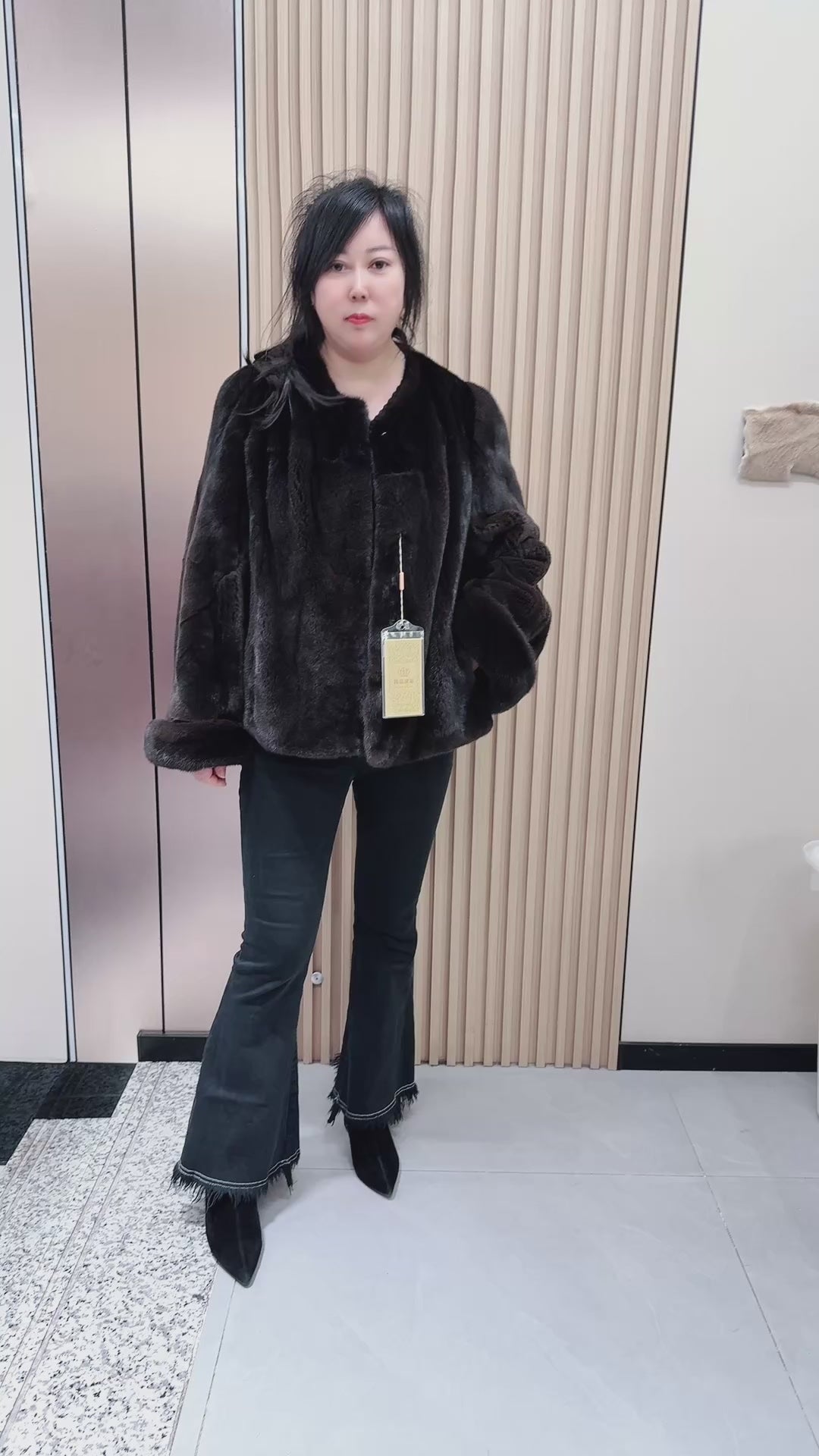 No. 073 Dark brown mink fur coat featuring a collarless design and turn-back cuffs.