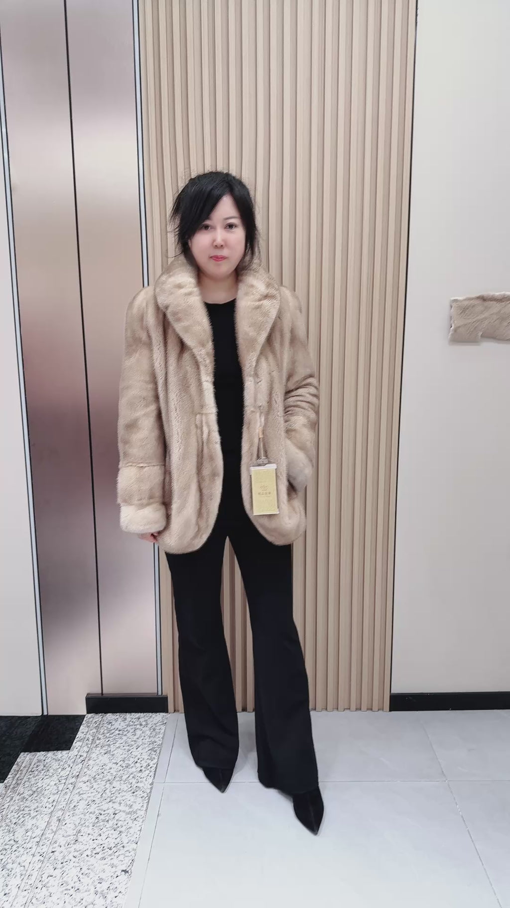 No. 099 Beige mink fur coat featuring a banana collar and a curved hem.