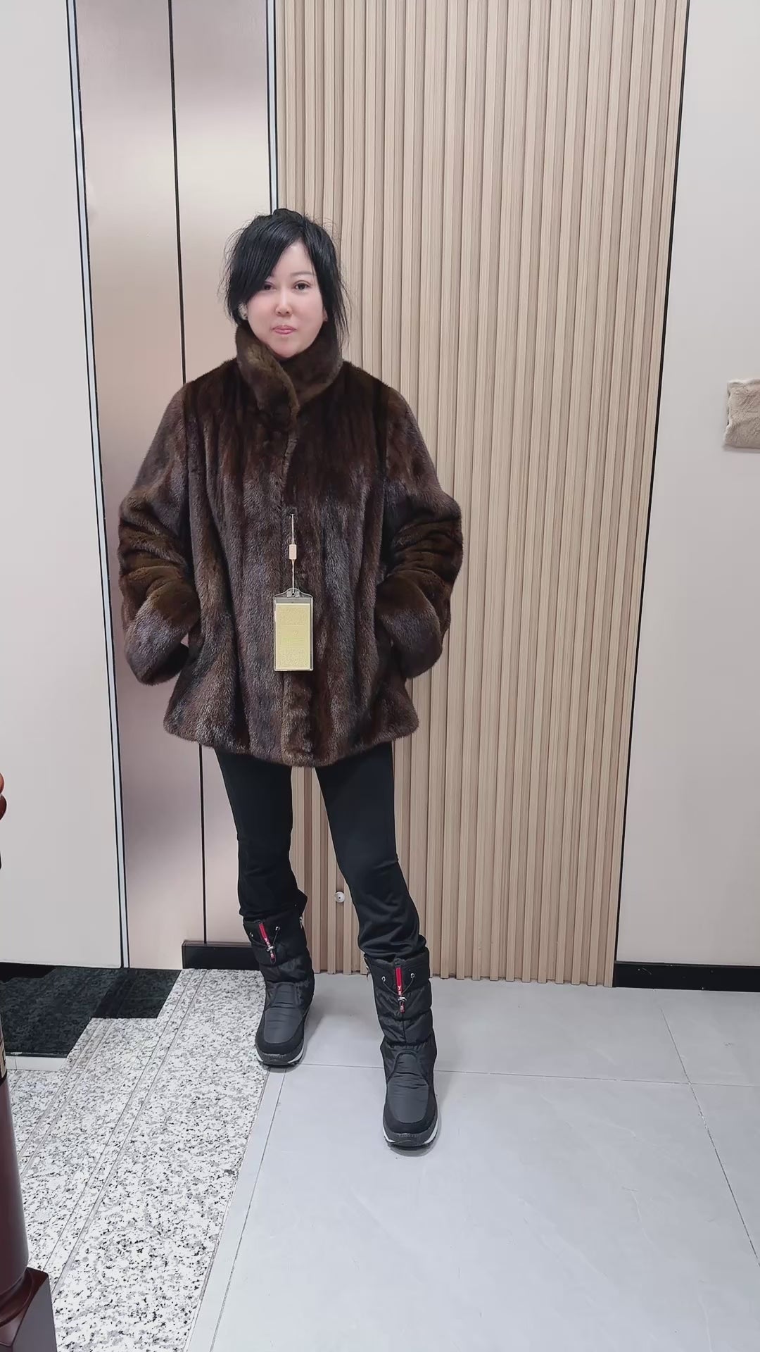 No. 070 Turquoise mink fur coat featuring a stand-up collar and turn-up cuffs.