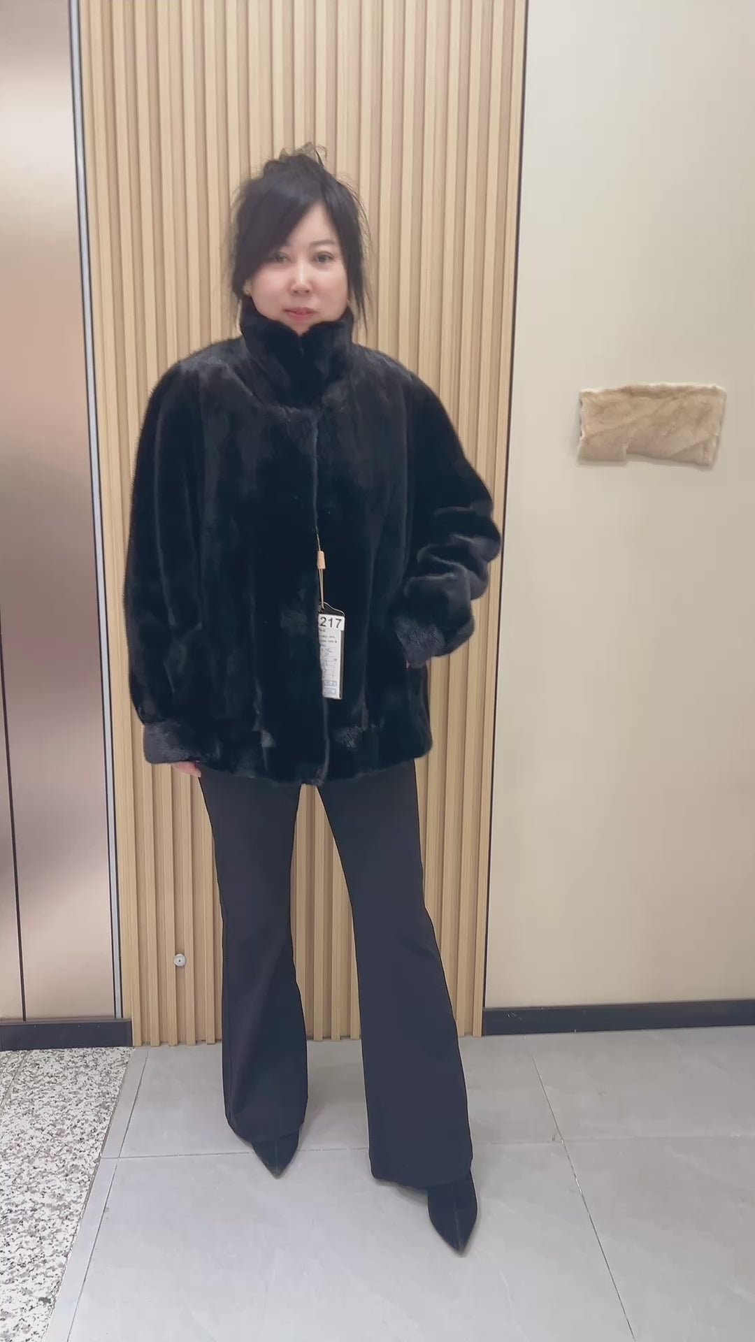 No. 217 black mink fur coat with a convertible stand-up collar.