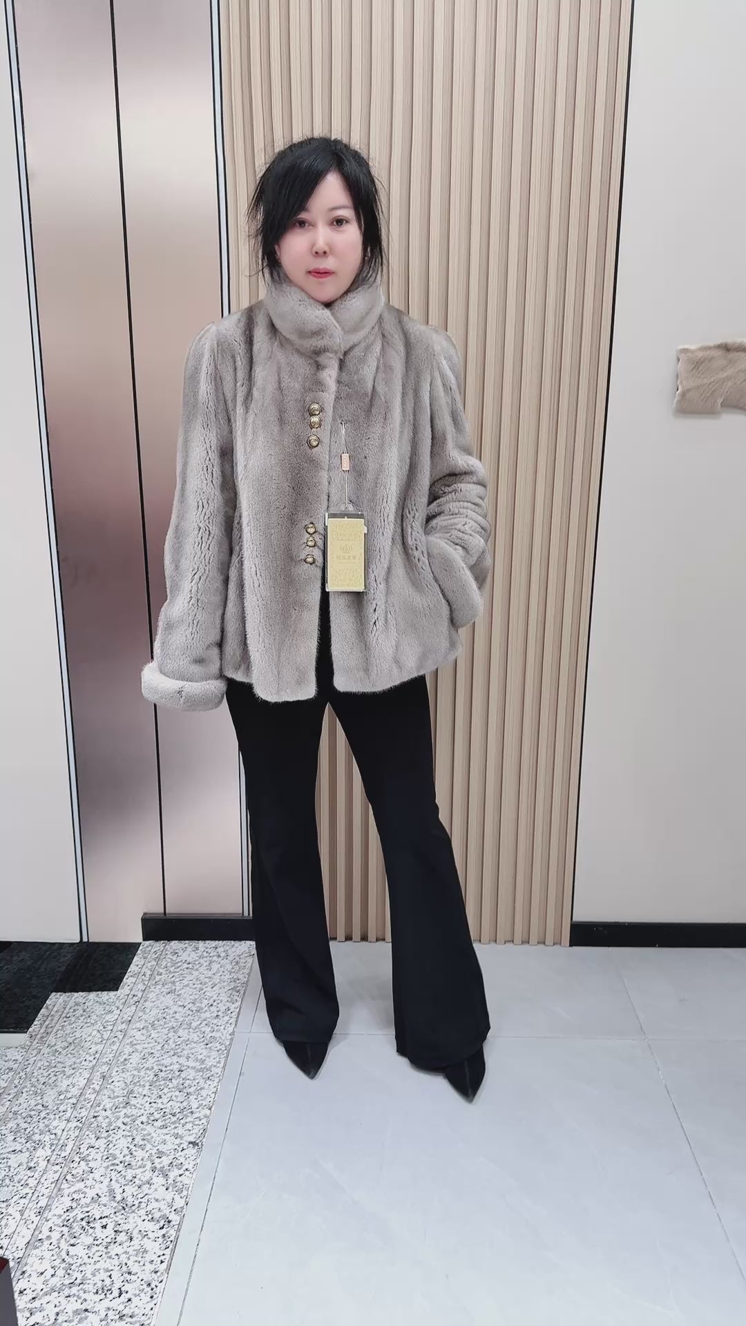 No. 097 Silver-blue mink fur coat, featuring a stand-up collar and turn-back cuffs accented with bronze-colored buttons.