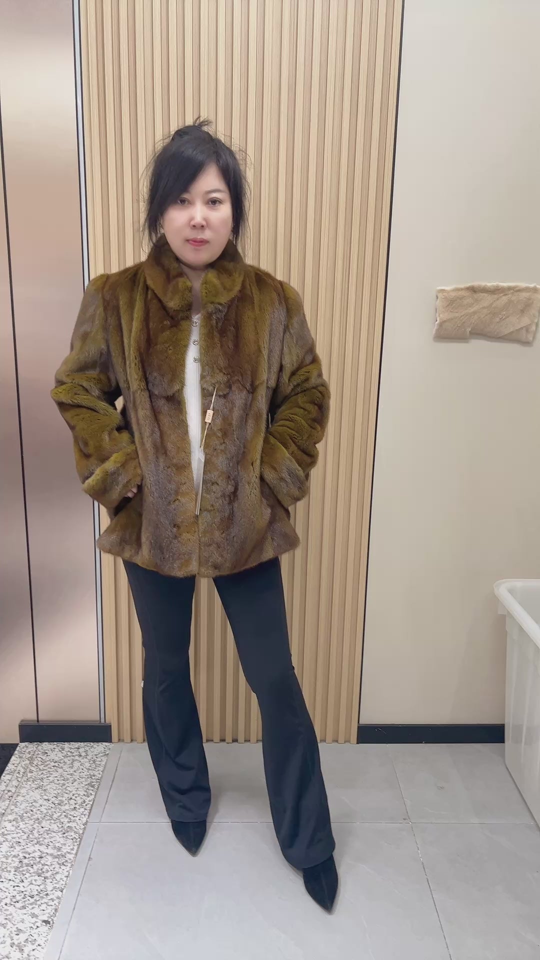 No. 240 turquoise mink fur coat featuring a stand-up collar and turn-back cuffs.