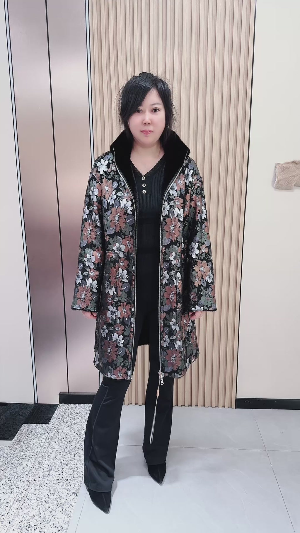 No. 043 Black reversible mink fur coat featuring a stand collar and zip closure.