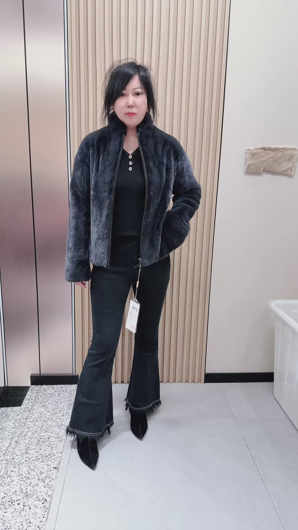 No. 072 Dark grey mink fur coat featuring a stand collar and zip closure.