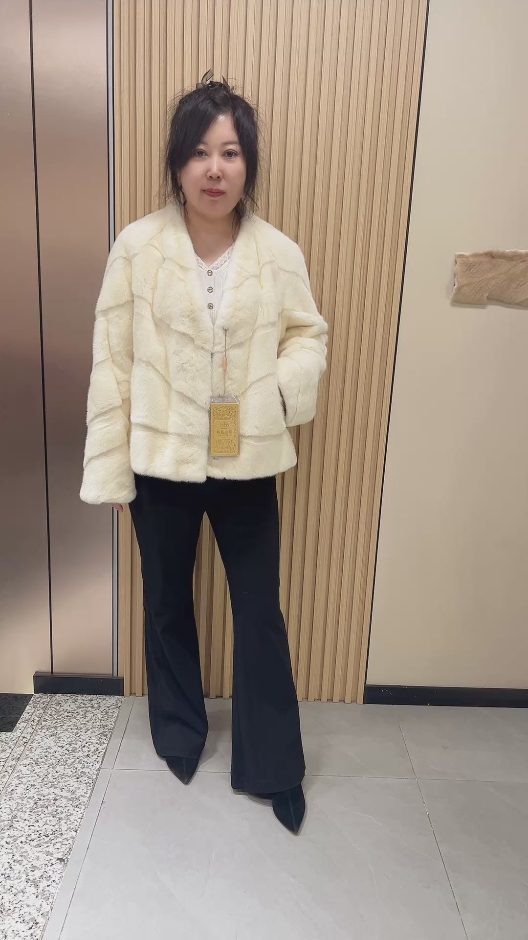 No. 153 Off-white V-neck mink fur coat featuring diagonal detailing.