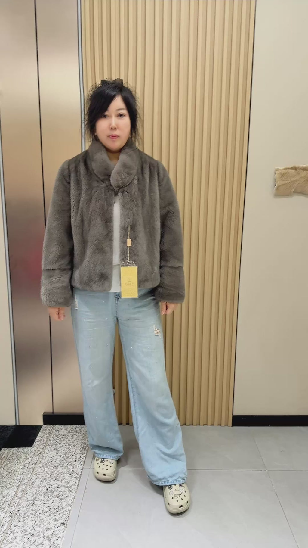 032 Latte-grey mink fur coat with a stand-up collar.