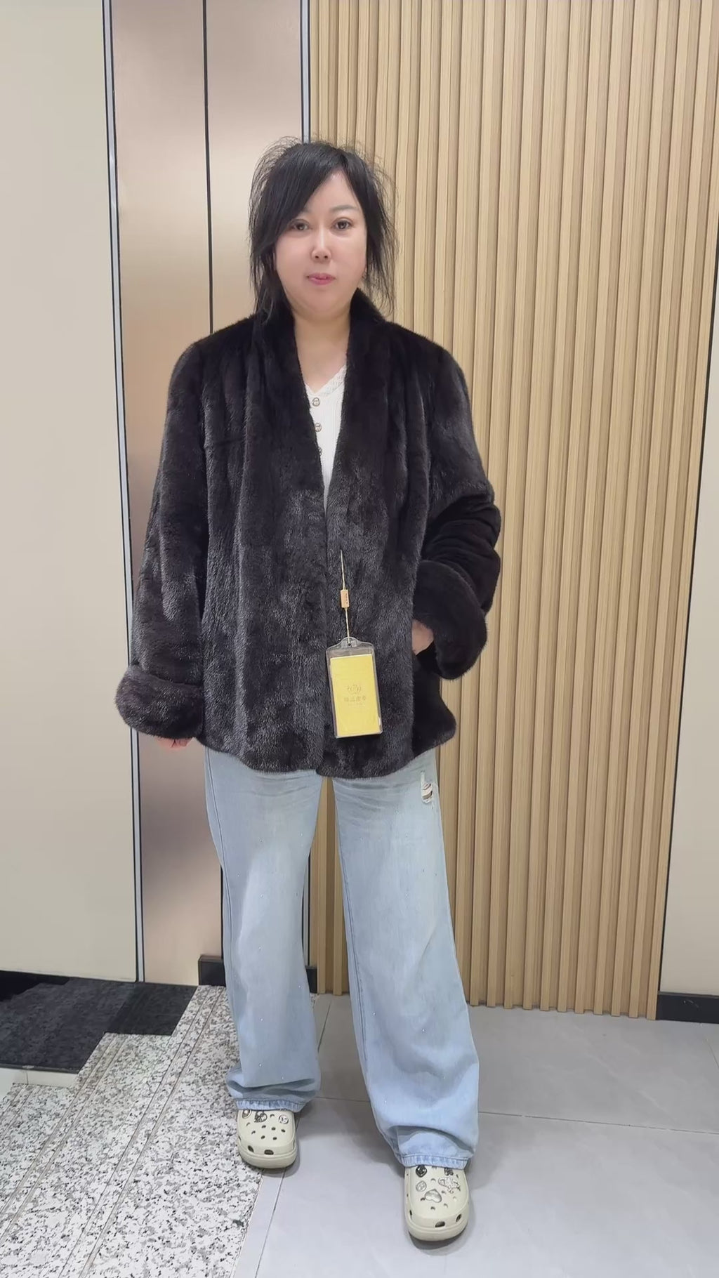 No. 010 Dark brown V-neck velvet-finish mink coat with roll-up sleeves.