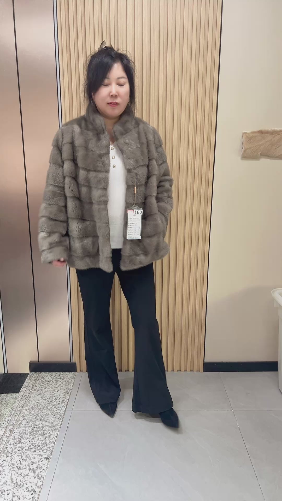 No. 160: Grey stand-collar mink fur coat featuring a horizontal panel design.