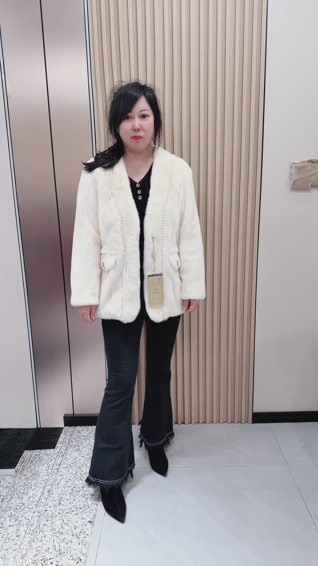 No. 079 White V-neck mink fur coat—Chanel style, accented with pearl details.