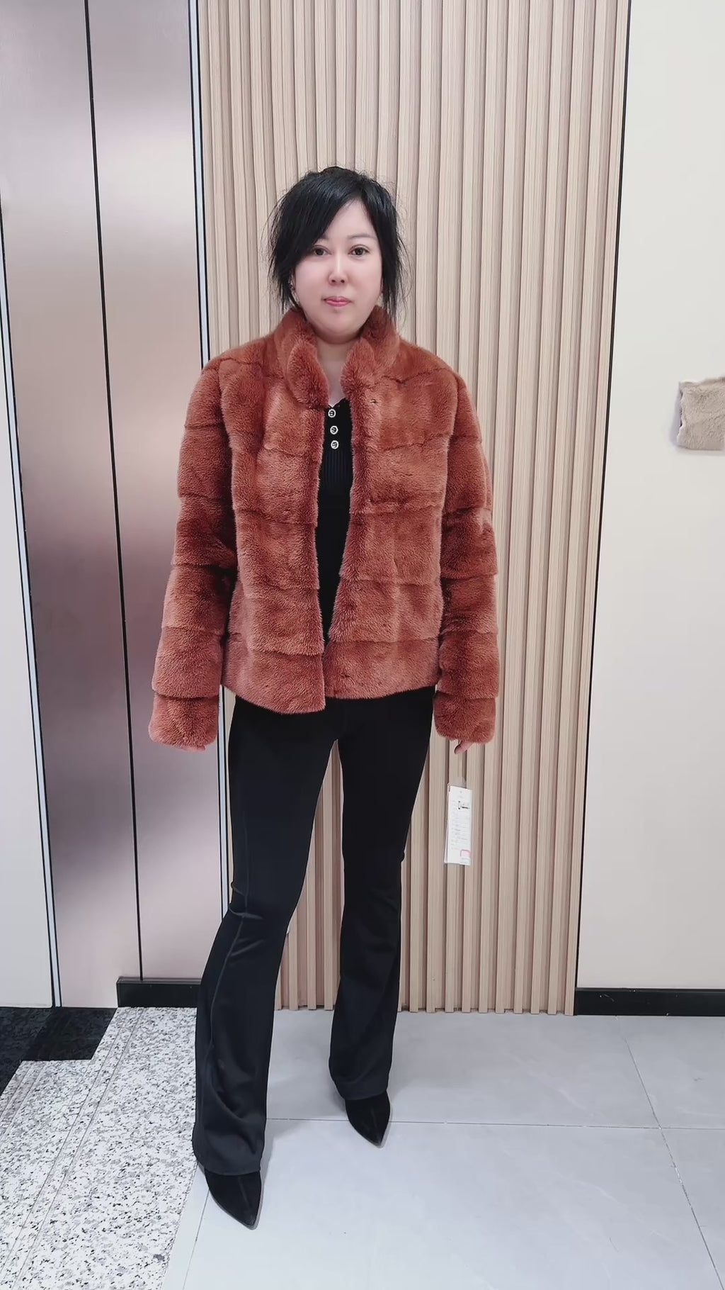 No. 044 Caramel-colored mink fur coat featuring a horizontal panel design.